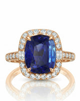 Natural cushion sapphire ring framed by luminous diamonds in 18K rose gold | SARATTI