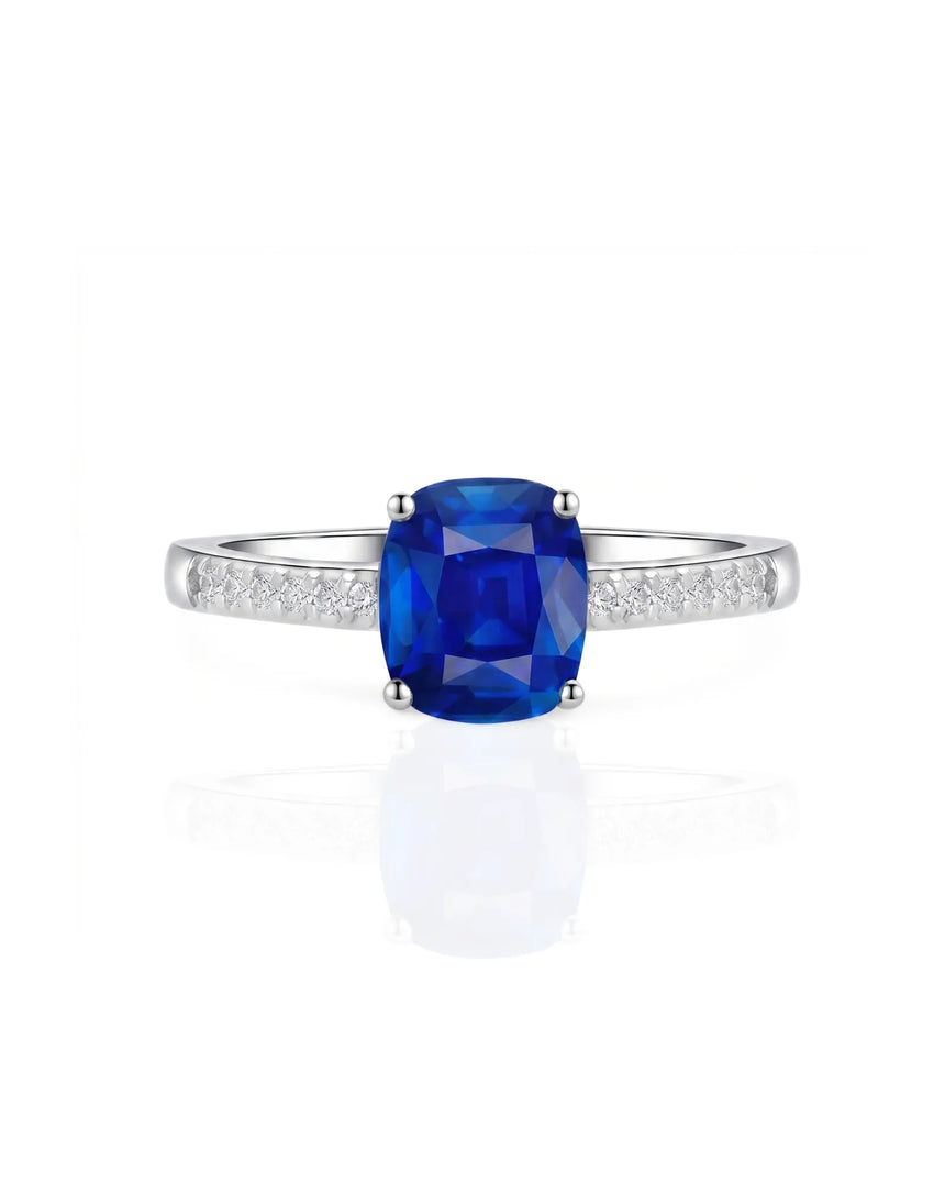 Natural cushion sapphire ring with delicate pavé diamonds in 18K white gold | SARATTI