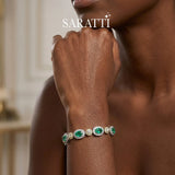 Natural emerald bracelet with oval halo settings | SARATTI