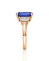 Natural emerald cut sapphire ring with matching diamond side stones in 18K rose gold | SARATTI