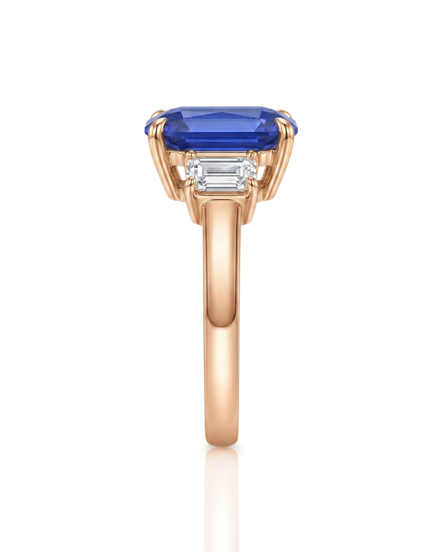 Natural emerald cut sapphire ring with matching diamond side stones in 18K rose gold | SARATTI