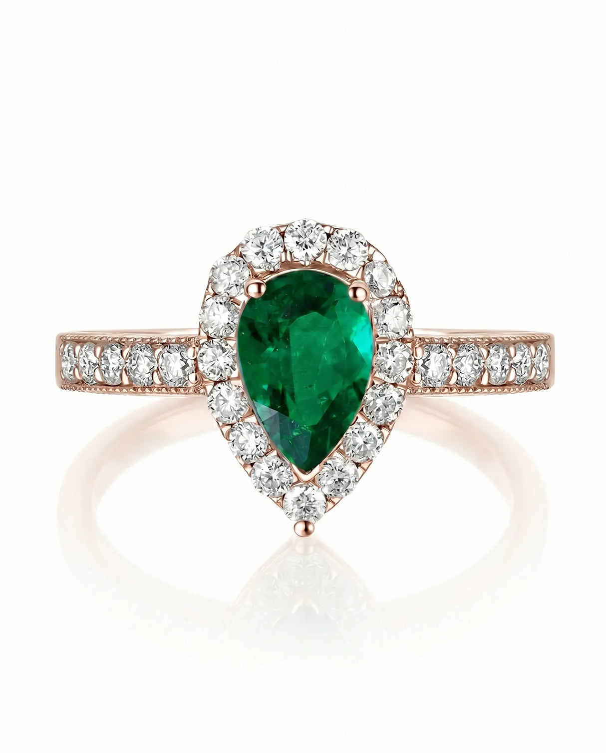 Natural emerald halo ring in 18K rose gold | SARATTI
