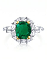 Natural emerald halo ring in platinum | SARATTI
