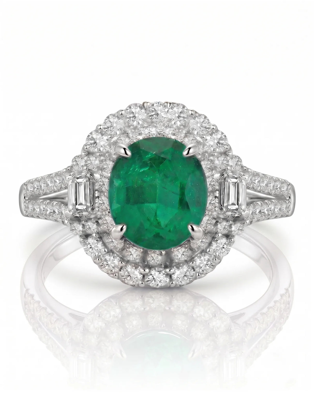 Natural emerald ring with diamond halo and split arc band in 18K white gold | SARATTI
