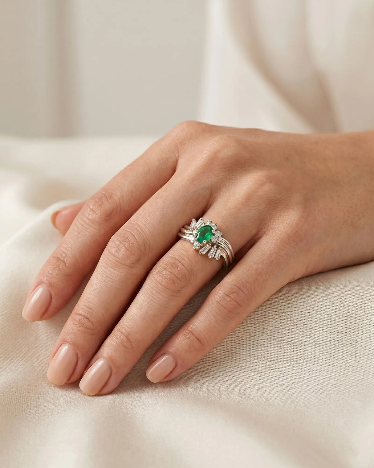 Natural emerald triple band ring with baguette and round diamonds in platinum | SARATTI