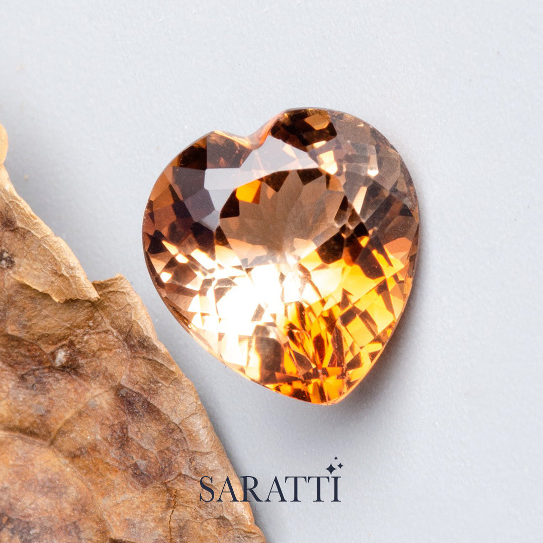Natural golden Imperial Topaz heart faceted gemstone top view | SARATTI