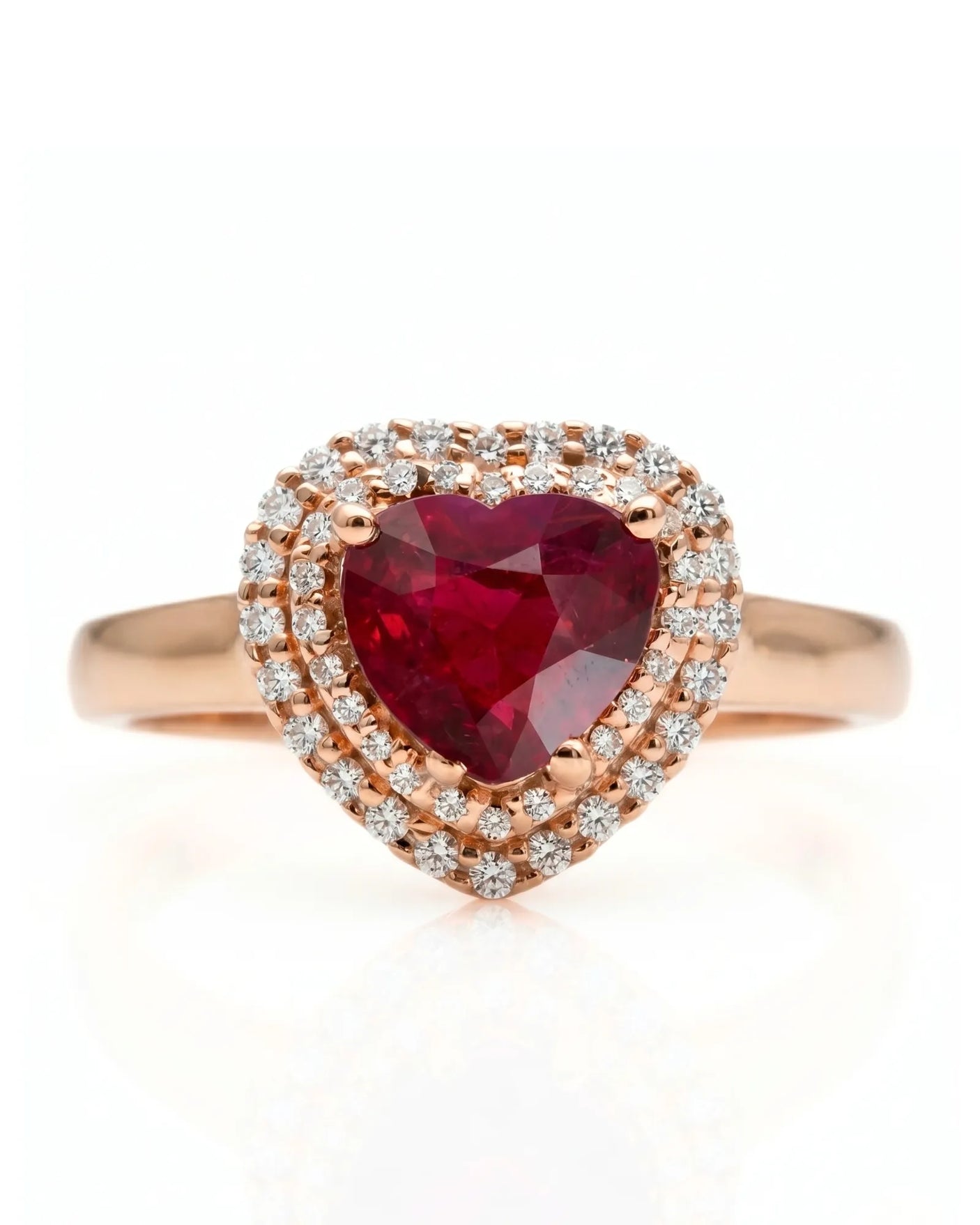 Natural heart ruby ring with sparkling diamond halo and romantic rose gold setting | SARATTI