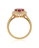 Natural heart ruby ring with sparkling diamond halo and warm yellow gold setting | SARATTI