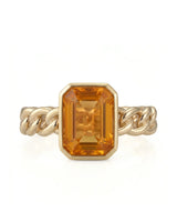 Natural orange sapphire ring with emerald cut center stone in 18K yellow gold | SARATTI