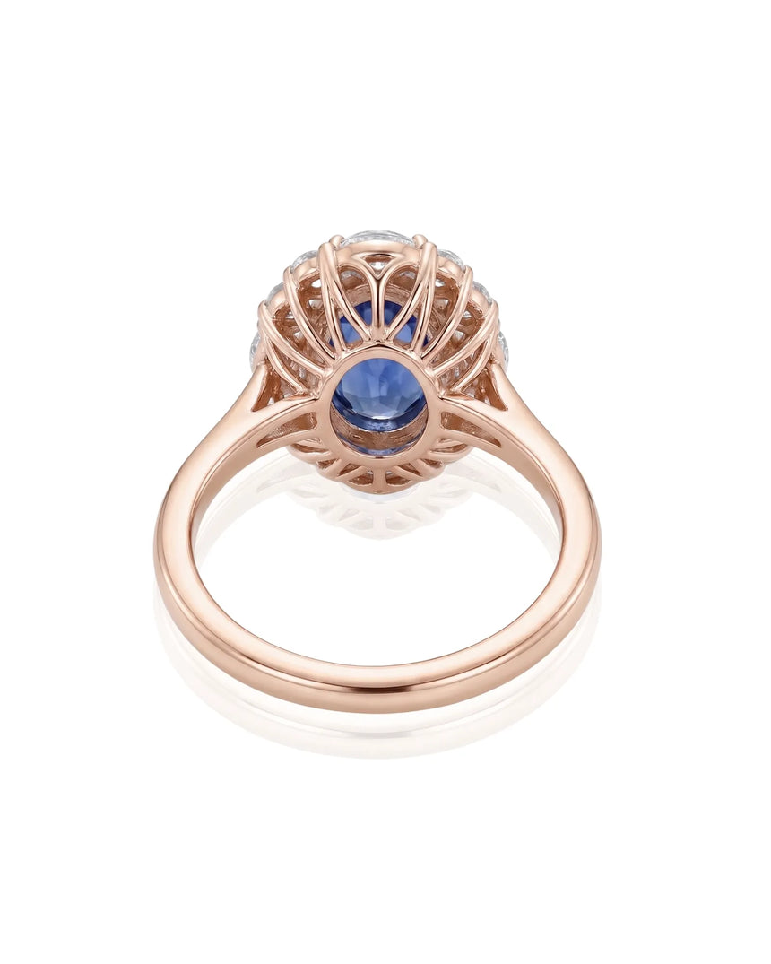 Natural oval blue sapphire ring with sparkling round diamonds in 18K rose gold | SARATTI