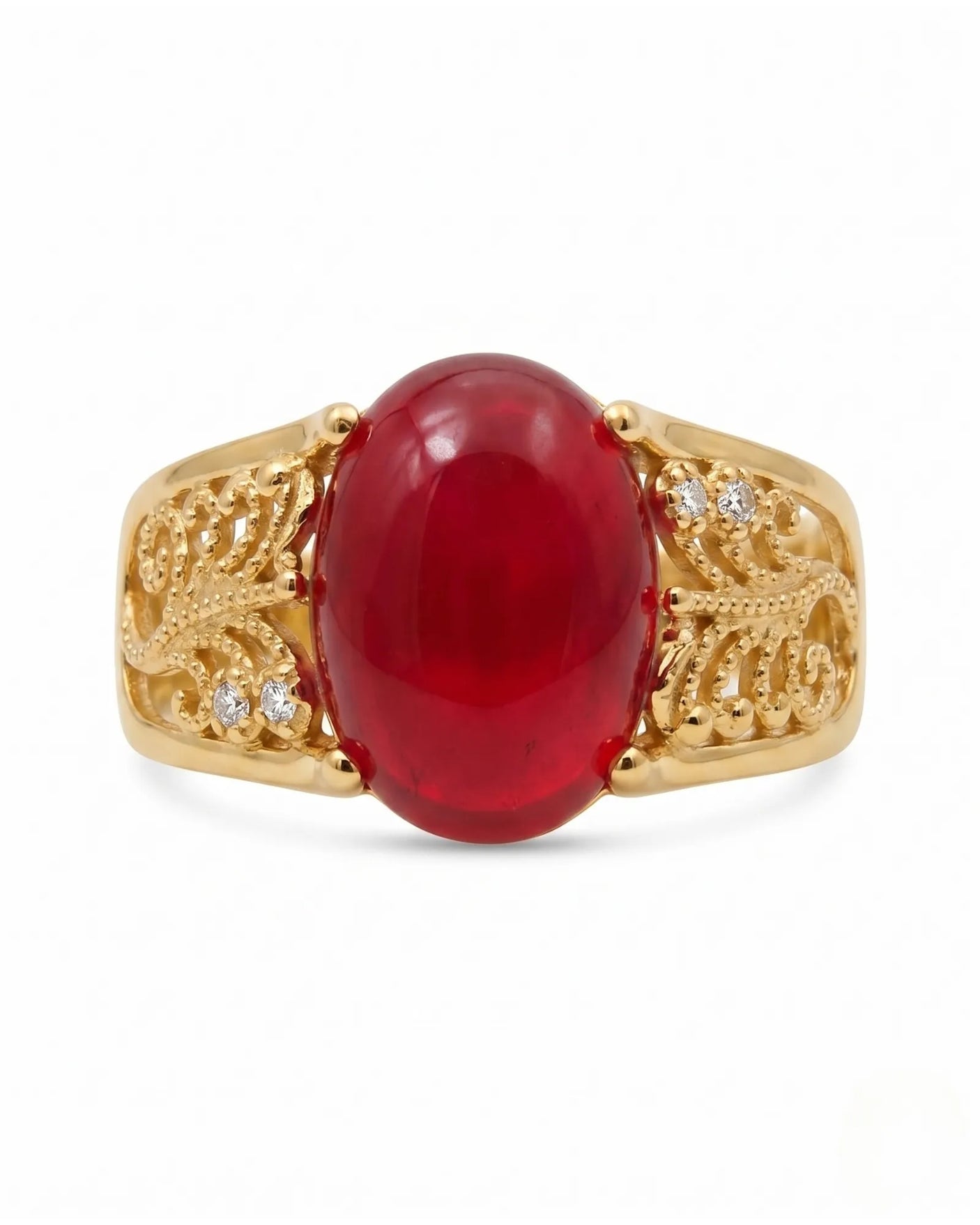 Natural oval cabochon ruby ring with diamond details and warm yellow gold setting | SARATTI