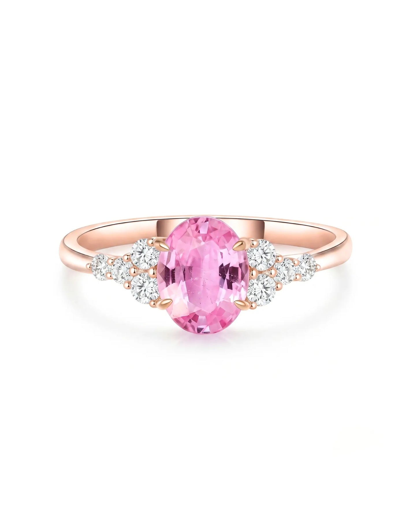 Natural oval pink sapphire ring with sparkling round diamonds in 18K rose gold | SARATTI