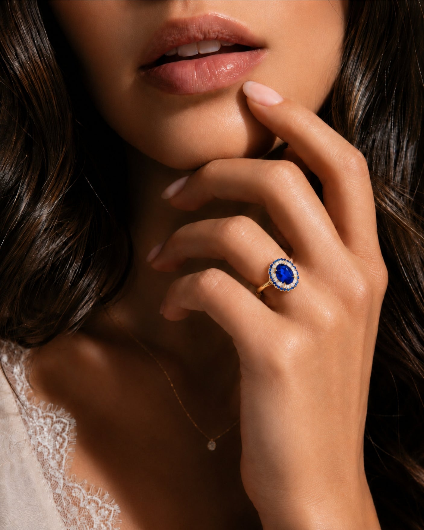 Natural oval royal blue sapphire ring with floral double halo in 18K yellow gold | SARATTI