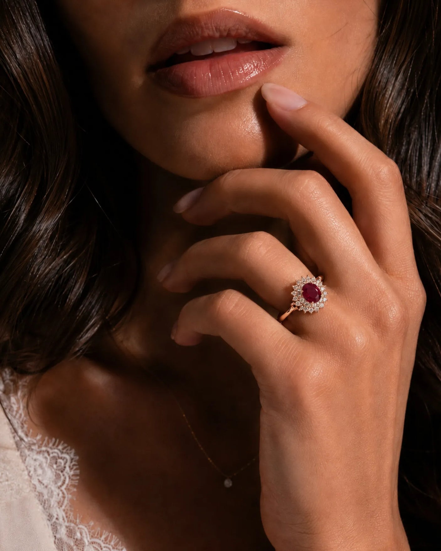 Natural oval ruby ring with sparkling diamonds and warm rose gold setting | SARATTI