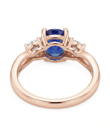 Natural oval sapphire ring with two round diamond accents in 18K rose gold | SARATTI