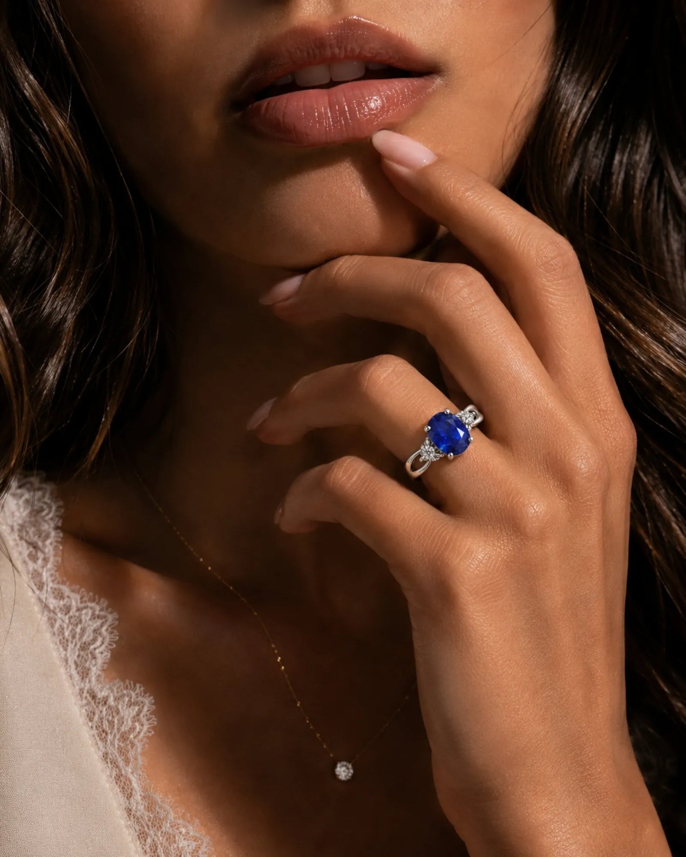 Natural oval sapphire ring with two round diamond accents in 18K white gold | SARATTI