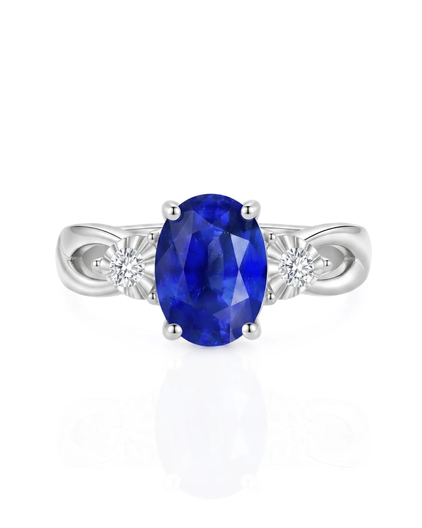 Natural oval sapphire ring with two round diamond accents in platinum | SARATTI