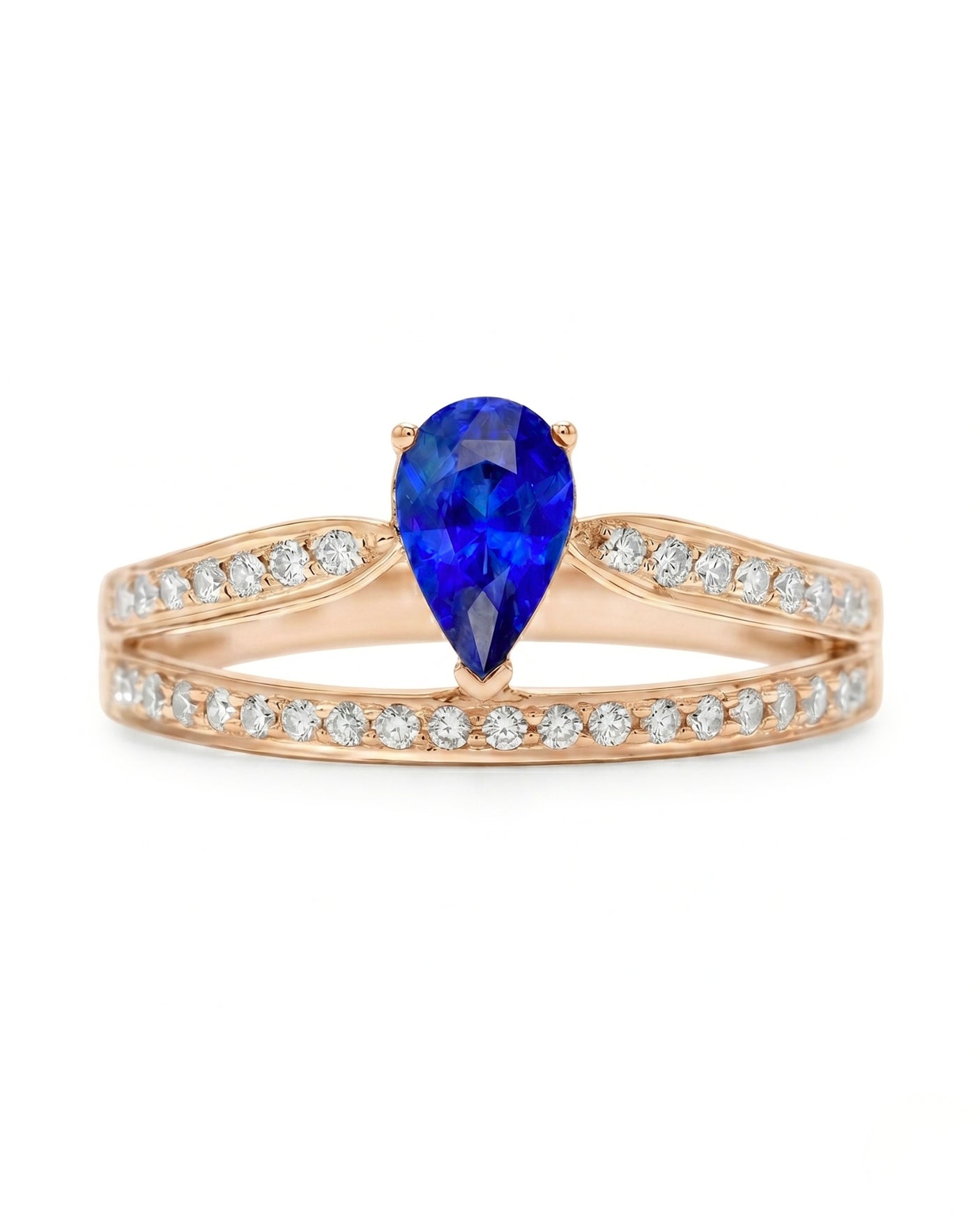 Natural pear blue sapphire ring with round diamond accents in 18K rose gold | SARATTI