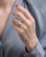 Natural princess cut diamond ring top view with diamond-set shoulders in platinum | SARATTI