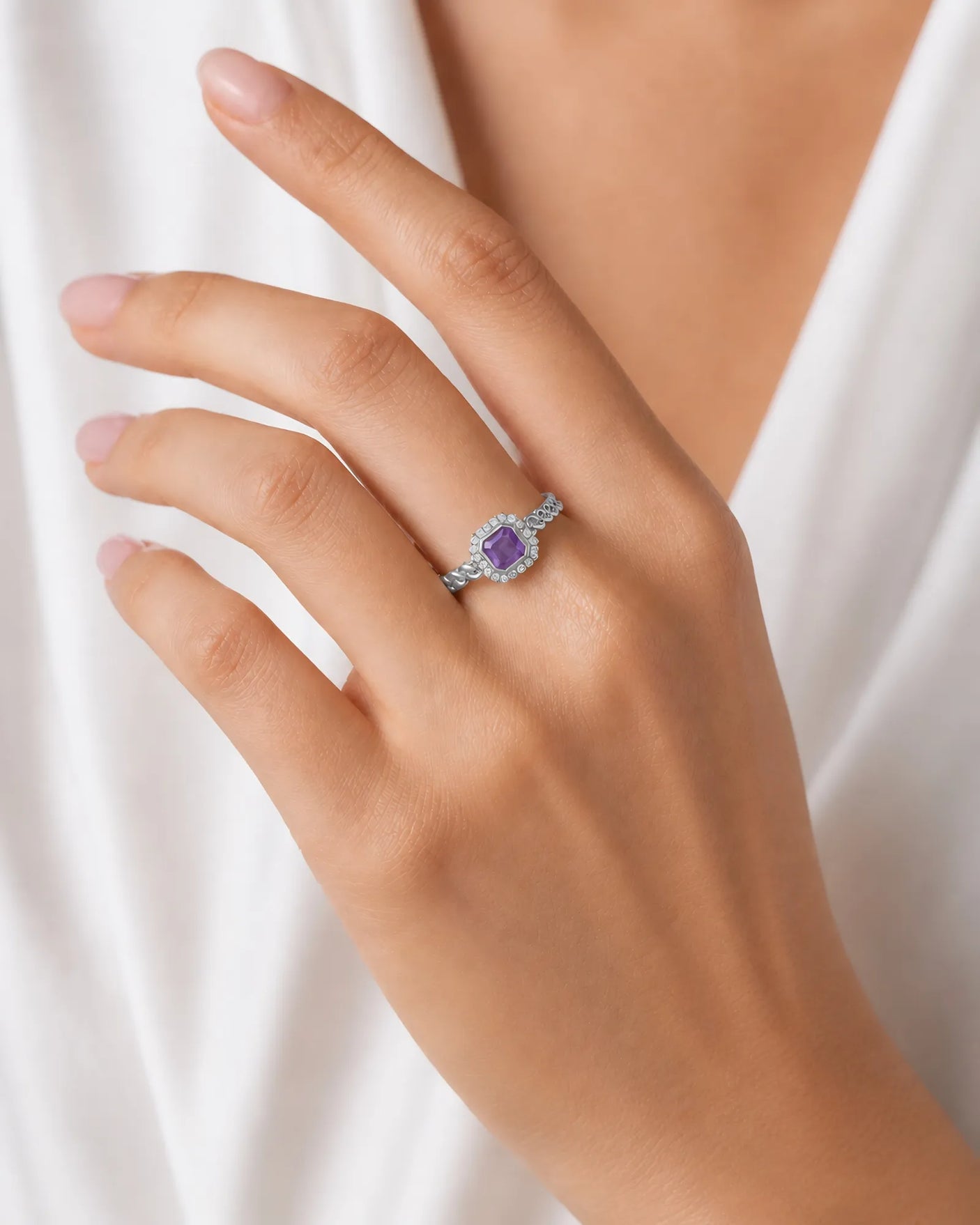 Natural purple sapphire statement ring with diamond halo in Platinum | SARATTI