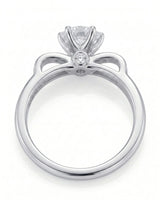 Natural round diamond ring with open ribbon-style shoulders in 18K white gold | SARATTI