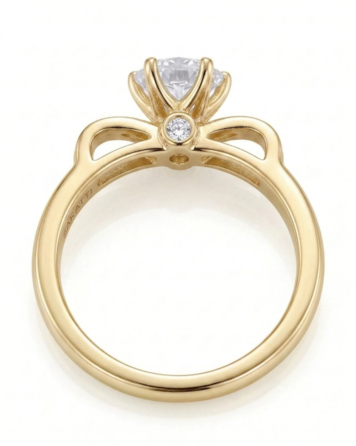 Natural round diamond ring with open ribbon-style shoulders in 18K yellow gold | SARATTI