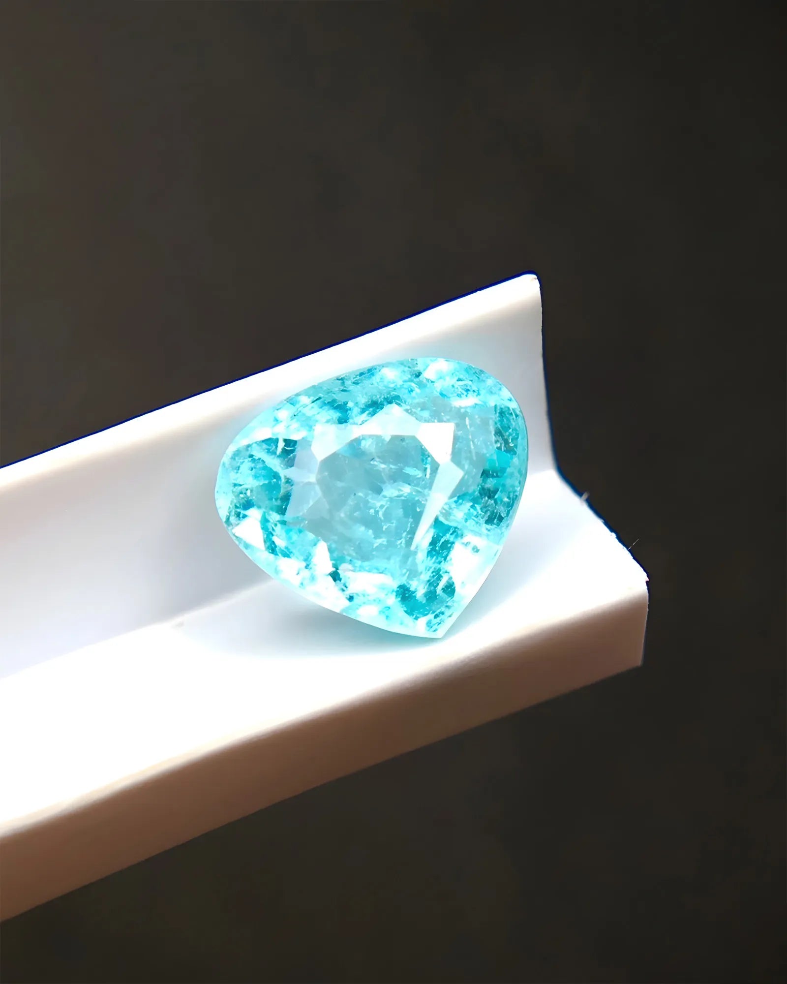 Neon blue natural Paraiba tourmaline loose stone pear cut | SARATTI
