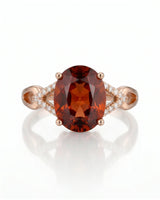 Orange garnet engagement ring with diamond frame in 18K rose gold | SARATTI