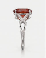 Orange garnet engagement ring with diamond frame in premium platinum | SARATTI