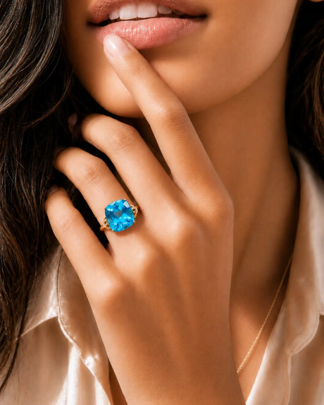 Ornate scrollwork topaz ring with diamond-accented loop shoulders in polished 18K rose gold | SARATTI
