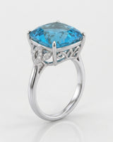 Ornate scrollwork topaz ring with diamond-accented loop shoulders in polished platinum | SARATTI
