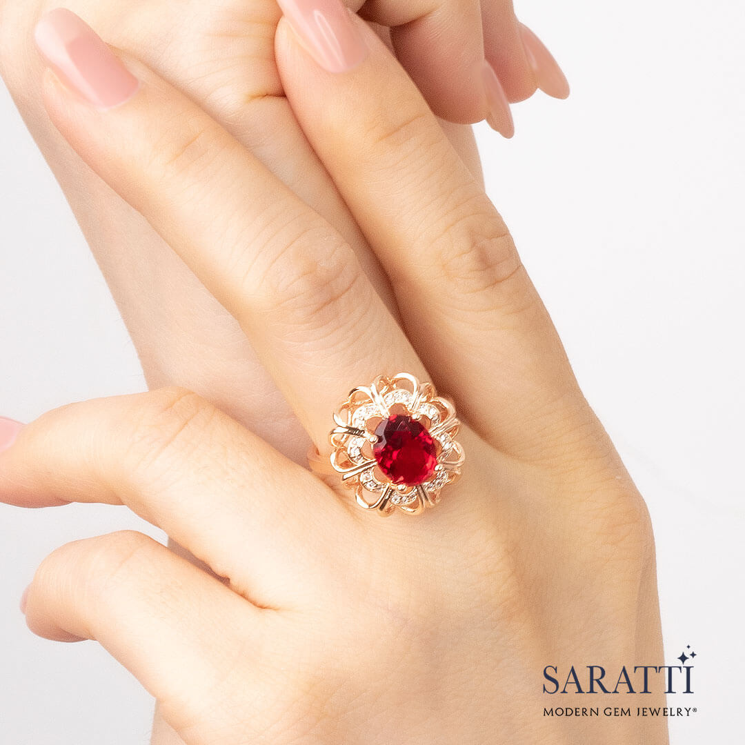 Side shot of the model wearing the Coronet Rouge 18K Rose Gold Garnet Ring | Saratti