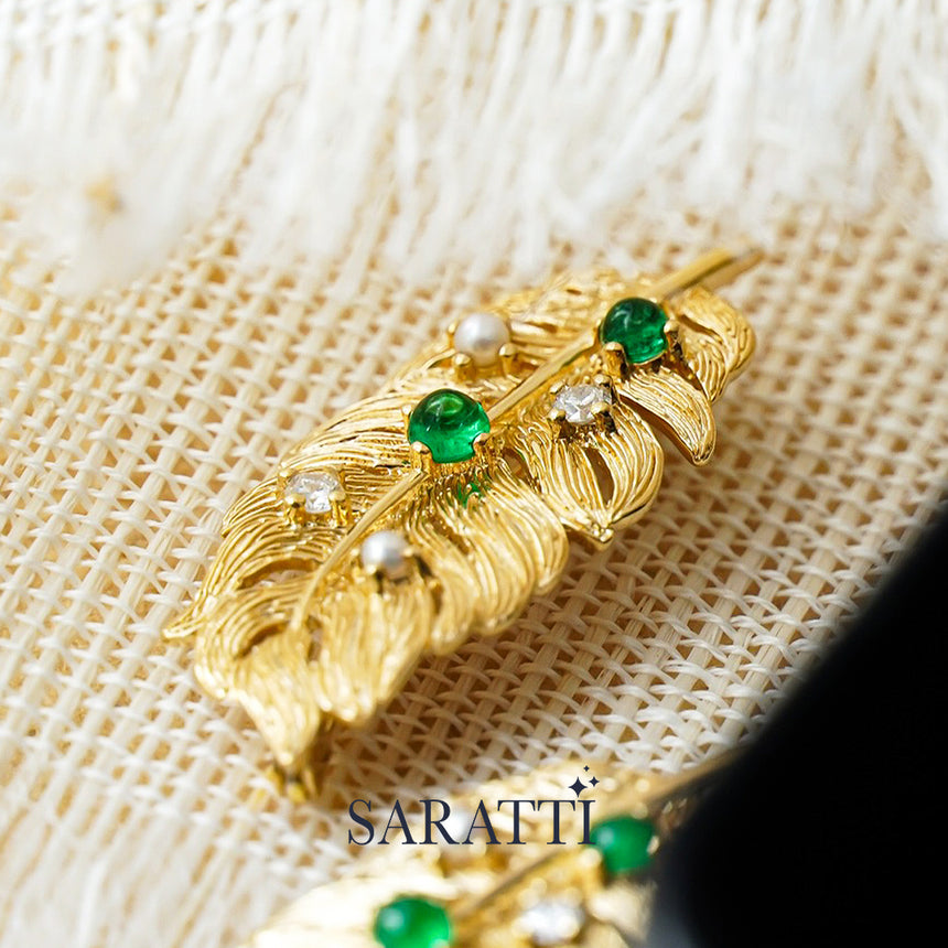 Sculpted feather jewelry brooch in yellow gold with gemstones | SARATTI
