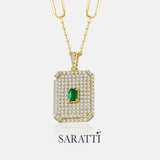 Diamond pavé pendant with vivid emerald centerpiece in pavillion style | SARATTI