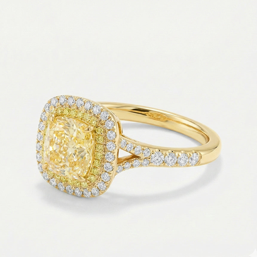 Cushion Fancy Yellow Split Shank diamond ring luxury handcrafted ring grey background angled view in 18K yellow gold | SARATTI