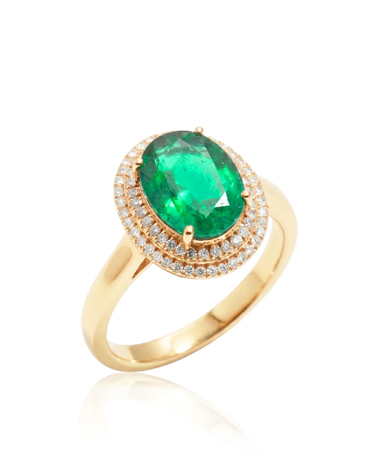 Oval Halo Eterna natural emerald and diamond ring in 18K yellow gold | SARATTI