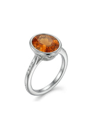 Oval Imperial Topaz bezel setting ring in white gold | SARATTI