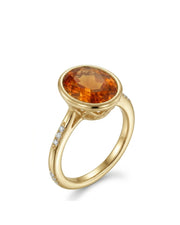 Oval Imperial Topaz bezel setting ring in yellow gold | SARATTI