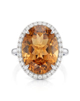 Oval Imperial Topaz diamond halo ring platinum setting | SARATTI