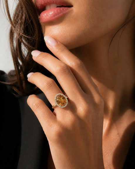 Oval Imperial Topaz halo ring with diamond setting yellow gold | SARATTI