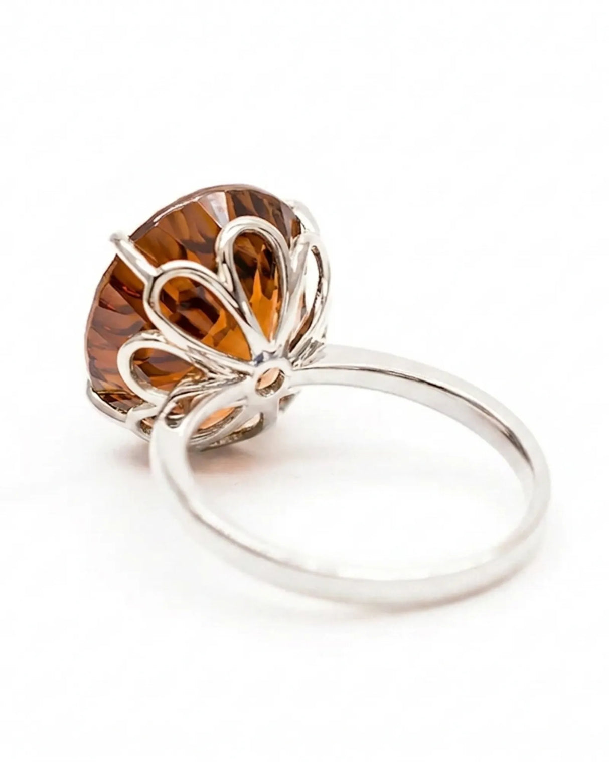 Oval Imperial Topaz solitaire ring with open floral basket and refined polished platinum band - SARATTI