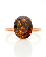 Oval Imperial Topaz solitaire ring with open floral basket and romantic 18K rose gold band - SARATTI