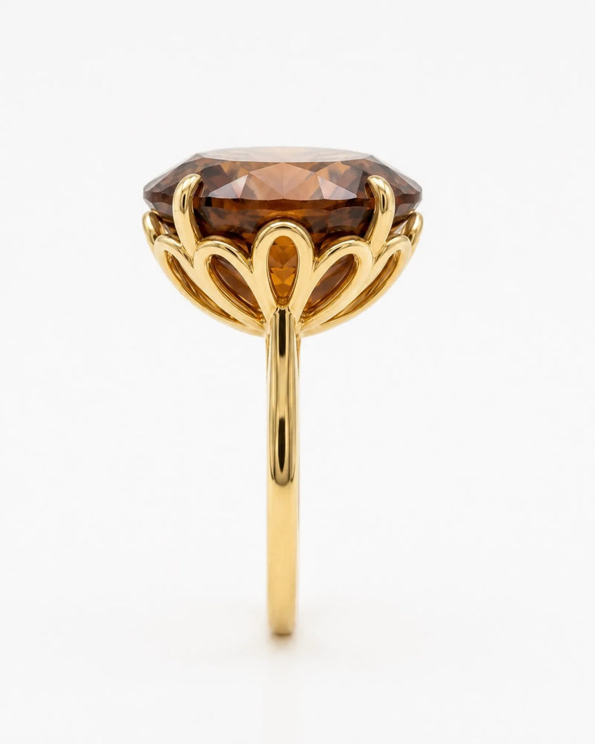 Oval Imperial Topaz solitaire ring with open floral basket and warm 18K yellow gold band - SARATTI