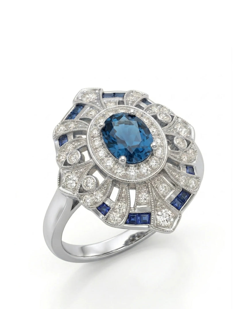 Oval London Blue topaz ring with diamond halo and geometric blue accents in polished platinum | SARATTI