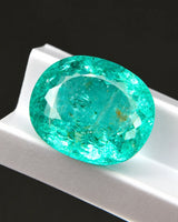 Oval Natural Tourmaline with faceted surface and blue-green colour | SARATTI