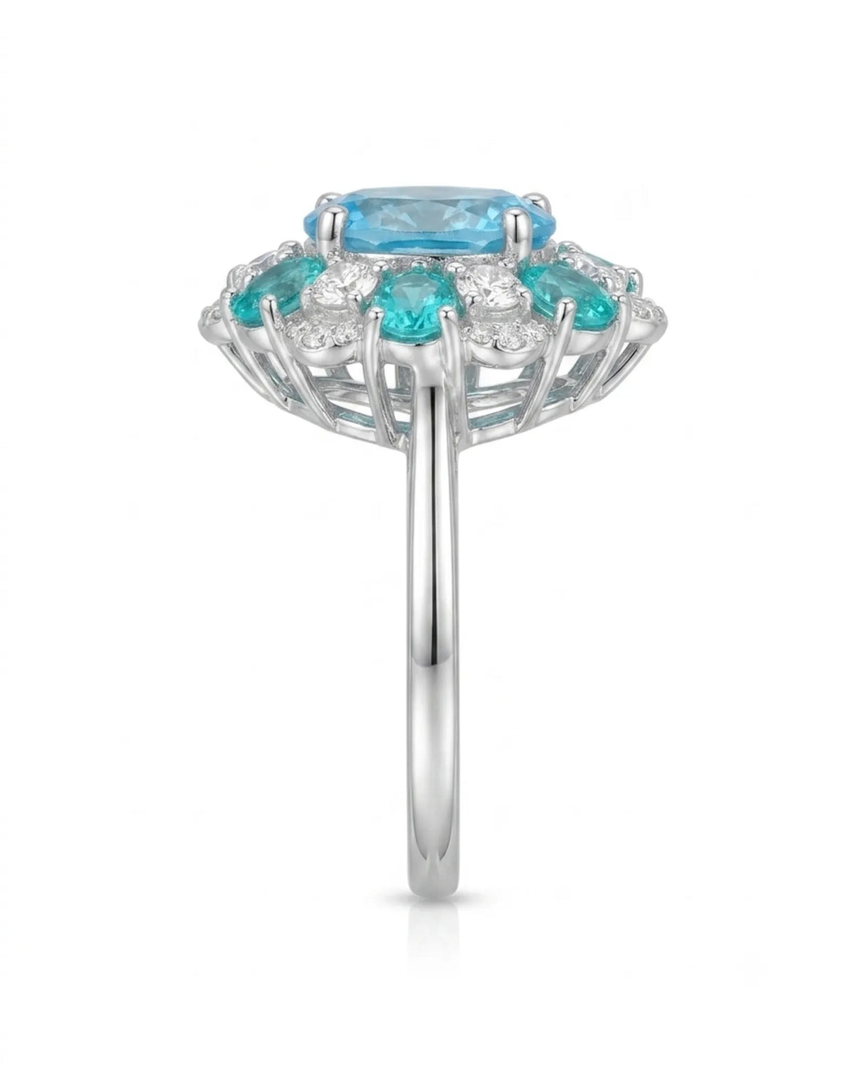 Oval Swiss Blue topaz ring framed by teal apatites and round diamonds in platinum | SARATTI