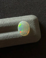 Oval White Opal cabochon with polished dome surface | SARATTI