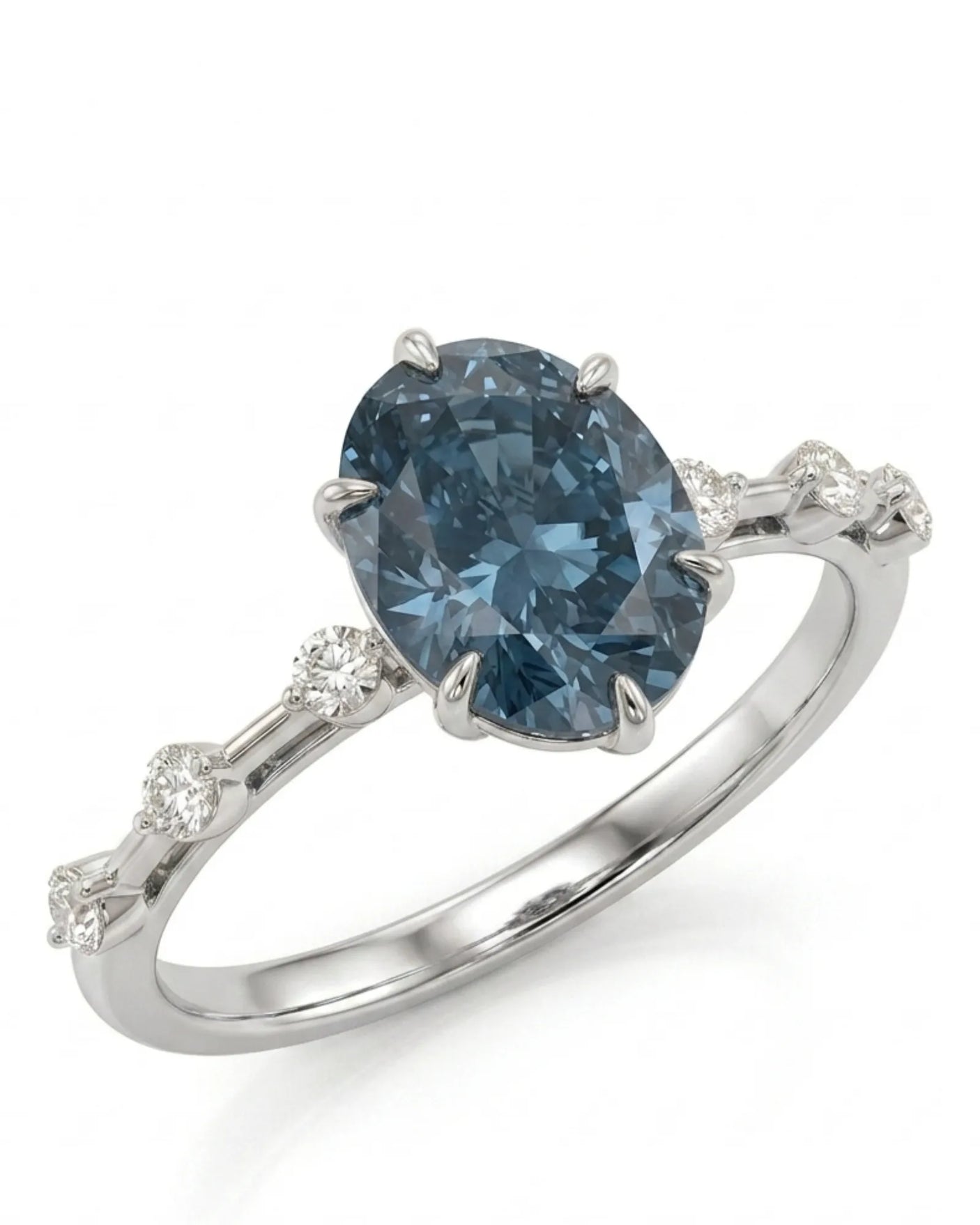 Oval blue moissanite engagement ring with round shoulder accents crafted in platinum | SARATTI