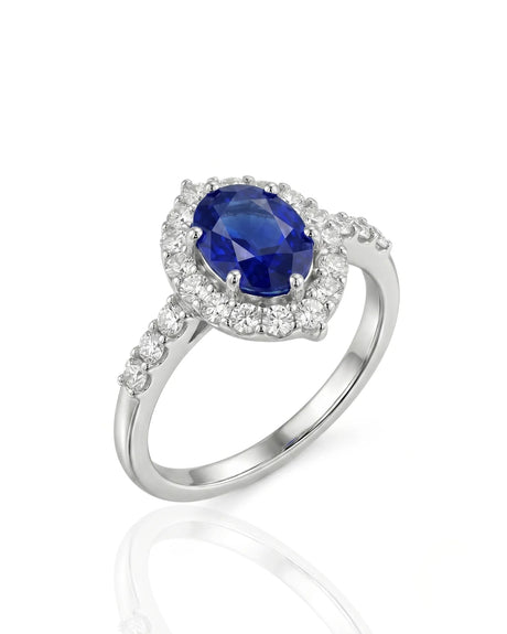 Oval blue sapphire halo ring with natural diamonds in 18K white gold | SARATTI