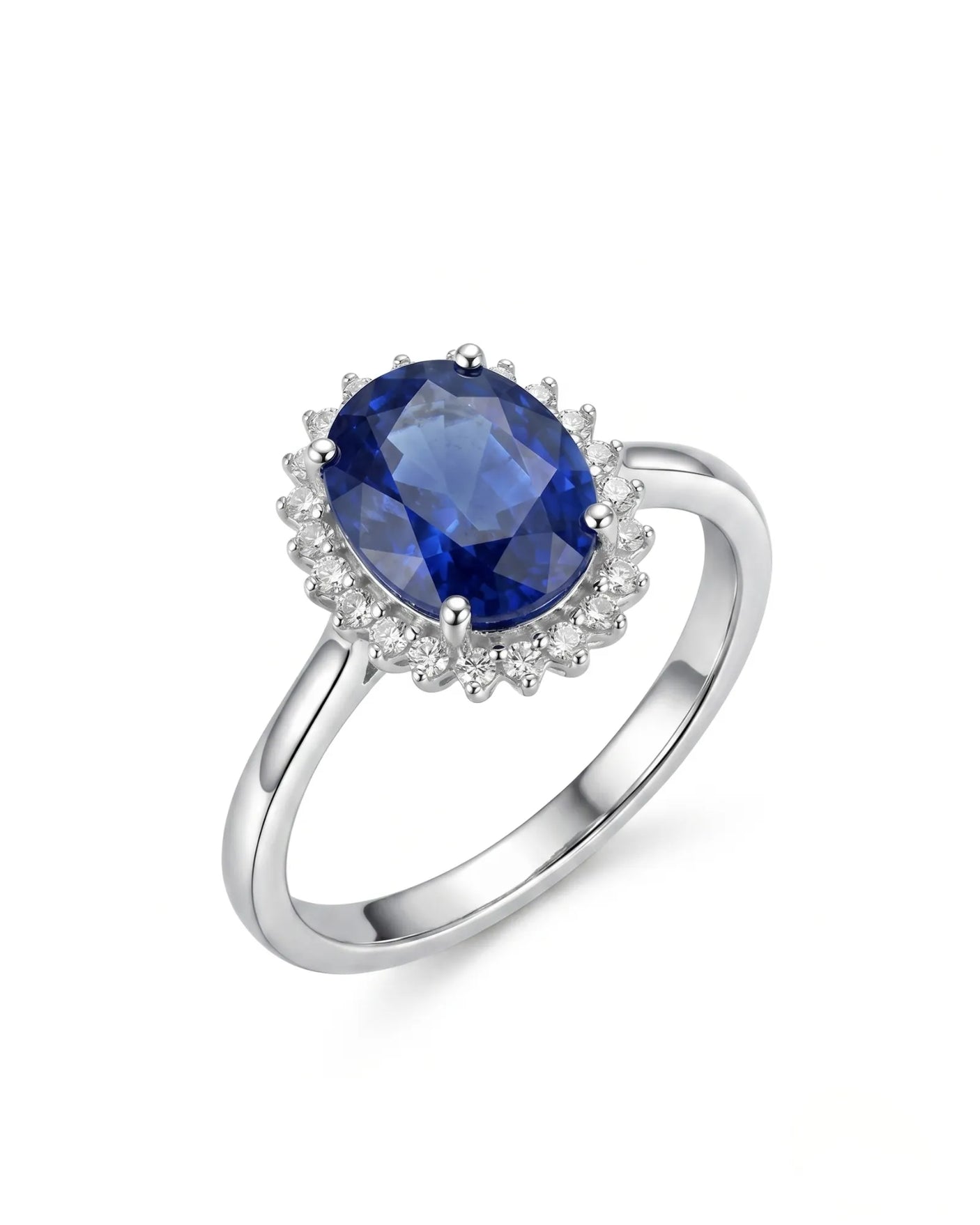 Oval blue sapphire promise ring with sunburst diamond halo in platinum | SARATTI